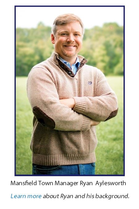 R. Aylesworth at signpost with caption Opens in new window