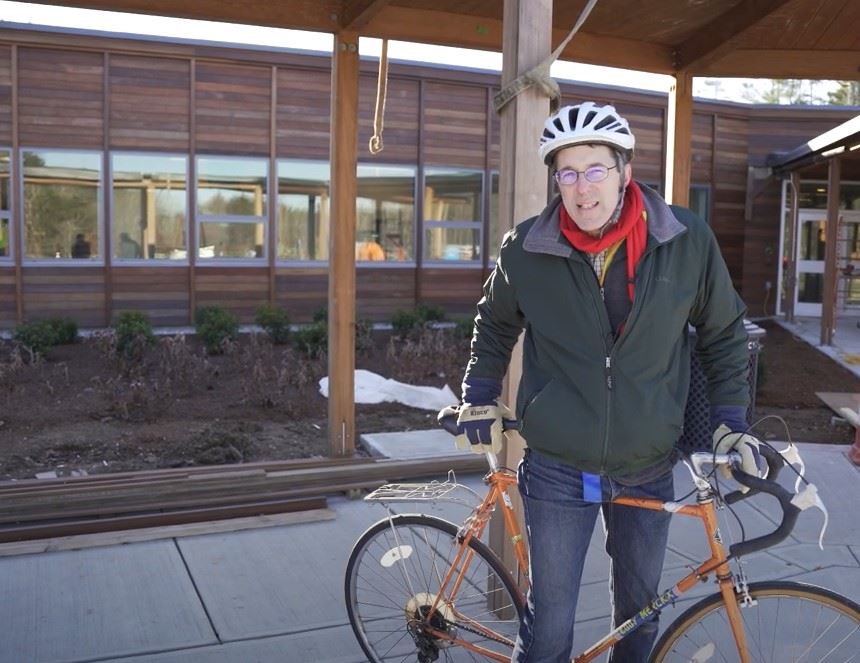 Chris in front of school